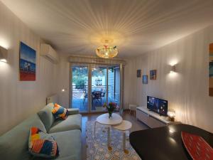 Appartements 150 m plage, piscine, clim, parking prive, entre Monaco & Menton, calme & Luxe assure ! : photos des chambres