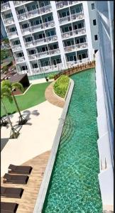 Breeze Residences - 1BR Unit with Balcony -Top Floor