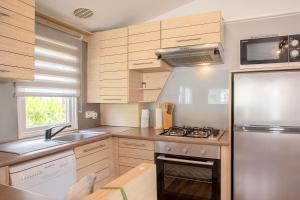 Appartements Mobil Home dans camping Frejus : photos des chambres