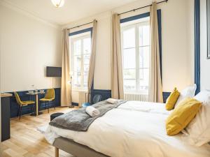 Appartements Ateliers Begand Studio 1 - Proximite Gare et Hypercentre : photos des chambres