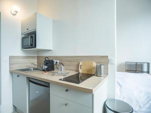 Appartements Ateliers Begand Studio 4 - Proximite Gare - Parking offert : photos des chambres