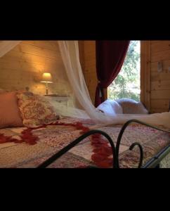 Maisons d'hotes Cabane Romantique cachee avec sa balneo : photos des chambres