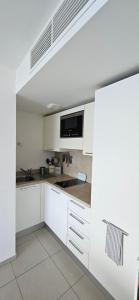 Appartements T2 de Standing Cote Plage, les pieds dans l'eau : photos des chambres