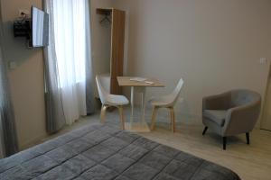 Hotels le saint Hubert : photos des chambres