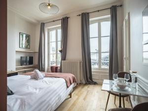 Appartements Ateliers Begand Studio 8 - Proximite Gare et Hypercentre : photos des chambres