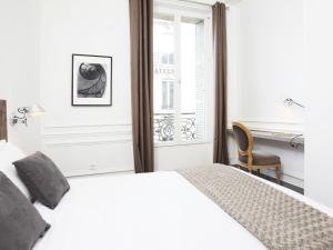 Appartements LivinParis - Luxury 3 Bedrooms Le Louvre I : photos des chambres