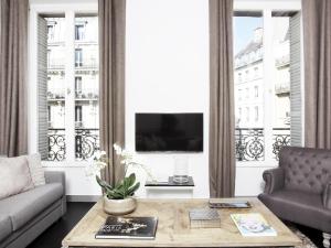 Appartements LivinParis - Luxury 3 Bedrooms Le Louvre I : photos des chambres