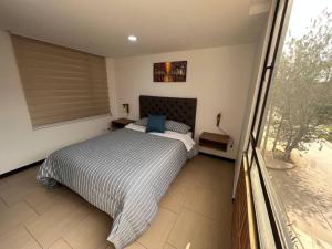 Encantador apartamento cerca al aeropuerto