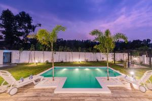 StayVista at Hilldale - Mountain-View Villa with Manicured Lawn, Quaint Gazebo, and Swimming Pool