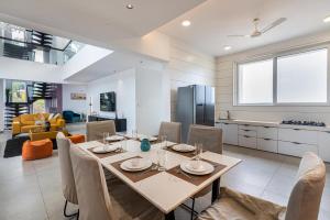 StayVista at Hilldale - Mountain-View Villa with Manicured Lawn, Quaint Gazebo, and Swimming Pool