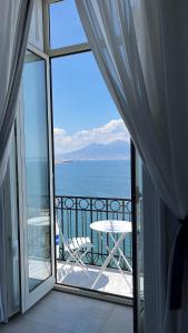 Doppelzimmer mit Balkon und Meerblick