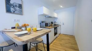 Appartements Le Noir’issime - Appartement tout equipe a Niort : photos des chambres