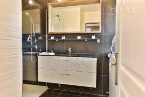 Appartements Bel appartement a proximite de toutes les commodites : photos des chambres