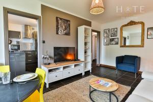 Appartements Bel appartement a proximite de toutes les commodites : photos des chambres