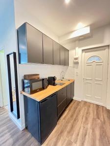 Appartements Belfast - studio dans un quartier anime de Reims : photos des chambres