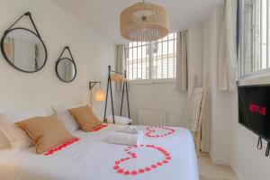 Appartements Le cosy en hypercentre : photos des chambres