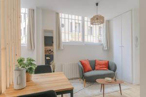 Appartements Le cosy en hypercentre : photos des chambres