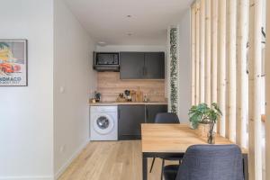 Appartements Le cosy en hypercentre : photos des chambres