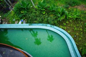 Maayaa riverside villa by KPM Tripenta