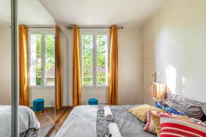 Appartements Botanica - Charmant appt niche en arriere-cour : photos des chambres