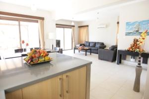 A three-bedroom villa with a private pool and landscaped garden Wi-Fi