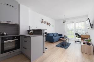 Family Apartment with Parking & Terrace by Noclegi Renters