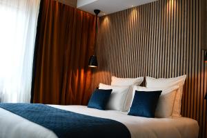 Hotels Le Cheval Blanc - Logis Hotel : photos des chambres