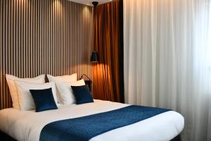 Hotels Le Cheval Blanc - Logis Hotel : photos des chambres