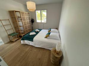 Maisons de vacances la villa d'Irissou YourHostHelper : photos des chambres