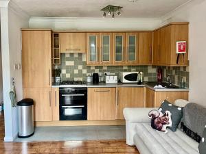 Large balcony apartment opposite rail station