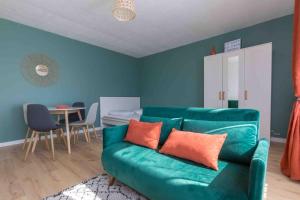 Appartements Le Cosy du Faux Bourg : photos des chambres