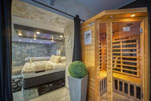 Appartements L'Eden Love - Jacuzzi / Sauna : photos des chambres