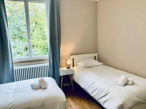 Appartements Chez Eugene, Maison-Jardin dans Rennes- 2 chambres : photos des chambres