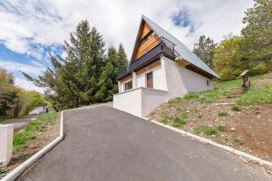 Maisons de vacances Superbesse - Maison avec vue sur la vallee : photos des chambres