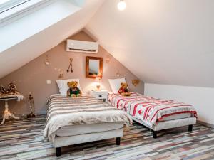 Maisons de vacances Holiday Home La Villa bleue by Interhome : photos des chambres