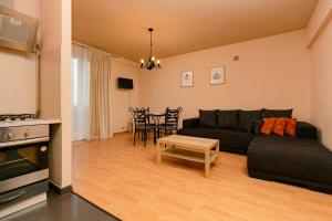 Wola Apartment with Balcony & close to Metro by Noclegi Renters