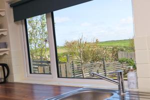 Coastal retreat surrounded by open countryside