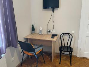 Джерельна 25, апартаменти в центрі з двома ізольованими спальнями