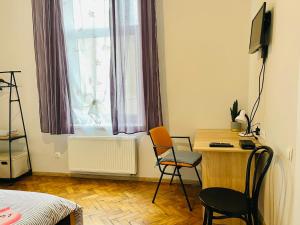 Джерельна 25, апартаменти в центрі з двома ізольованими спальнями