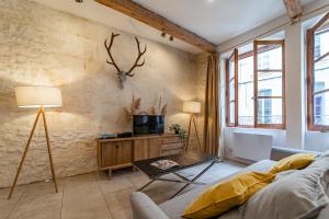 Appartements L'elegance de la pierre au pied de la Maison Carree - Une Nuit a Nimes : photos des chambres