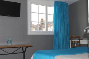 Hotels Les Colonnes : Chambre Triple - Vue sur Ville