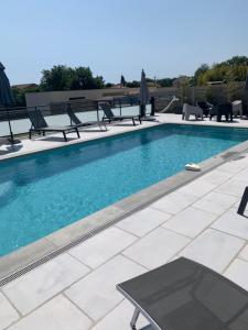 Villas A 700m de la plage,villa FAMIGLIA avec piscine : photos des chambres