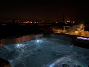 Elegant rooftop studio with shared terrace and jacuzzi MK2