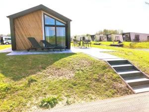 Familien und Angelurlaub Overijssel Chalet direkt am Wasser mit eigenem Bootsteg