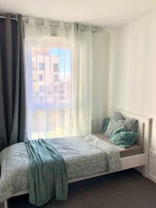 Sejours chez l'habitant Chambre dans logement neuf, entre paris et disney : Chambre Simple - Vue sur Jardin