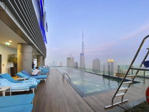 ALiving Luxury and Cozy 2BR with Infinity Pool I Near Dubai Mall & Burj Khalifa I Paramount Hotel Midtown
