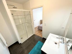 Appartements Grand appartement neuf de standing – Top Cosy : photos des chambres