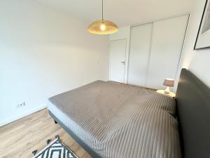 Appartements Grand appartement neuf de standing – Top Cosy : photos des chambres