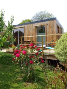 Appartements Tiny house dans jardin arbore : photos des chambres