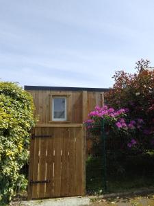 Appartements Tiny house dans jardin arbore : photos des chambres